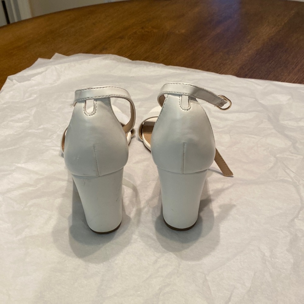 White platform heels